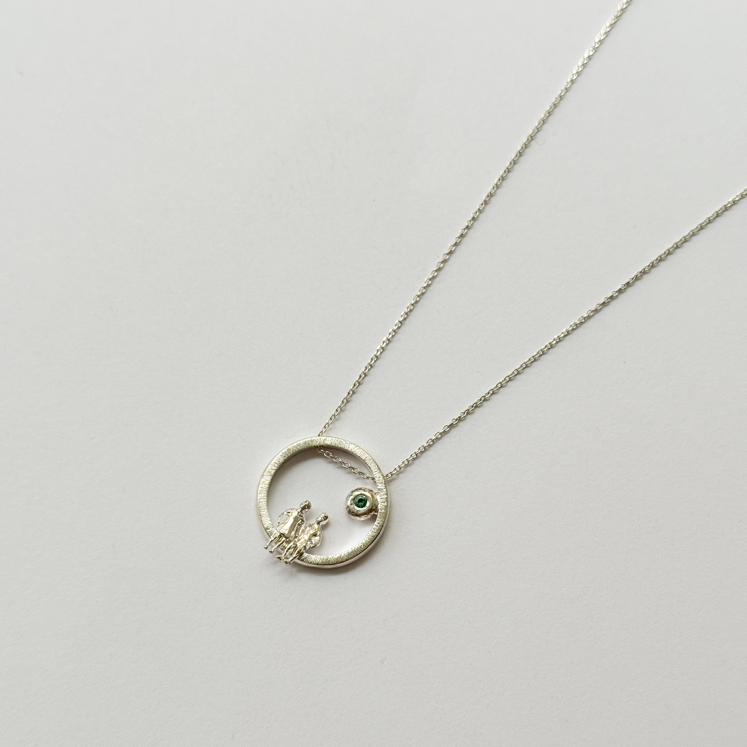 Silver Necklace with Emerald "All Around Us"