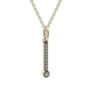 Gold and diamond necklace with letter 'I' pendant on a white background