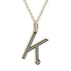 Gold and diamond necklace with letter 'K' pendant on a white background