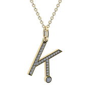 Gold and diamond necklace with letter 'K' pendant on a white background