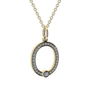 Gold and diamond necklace with letter 'O' pendant on a white background