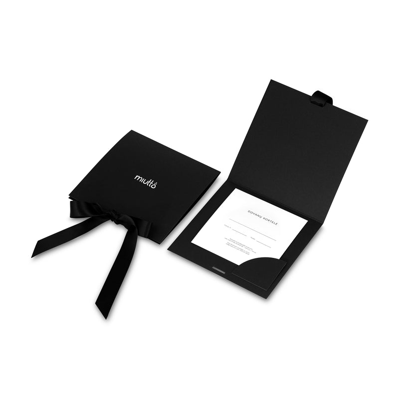 Black envelope with a ribbon and a card inside on a white background
