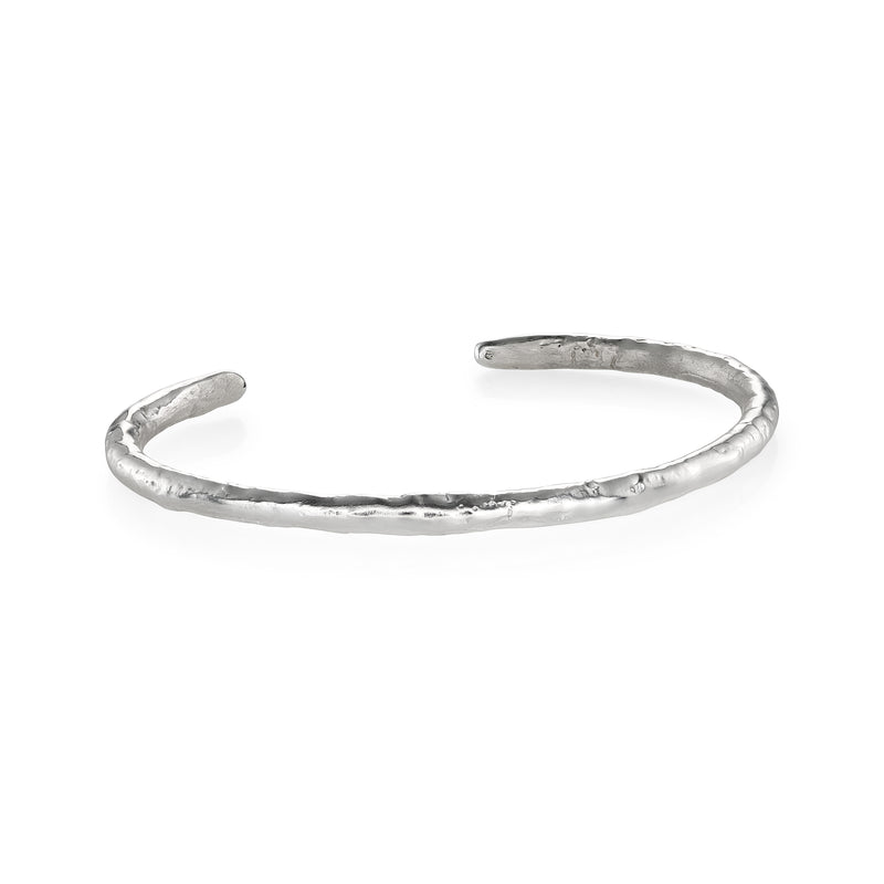 Silver cuff bracelet on a white background
