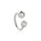 Open-band silver ring featuring asymmetrical ends with silver sphere and freshwater pearl. 