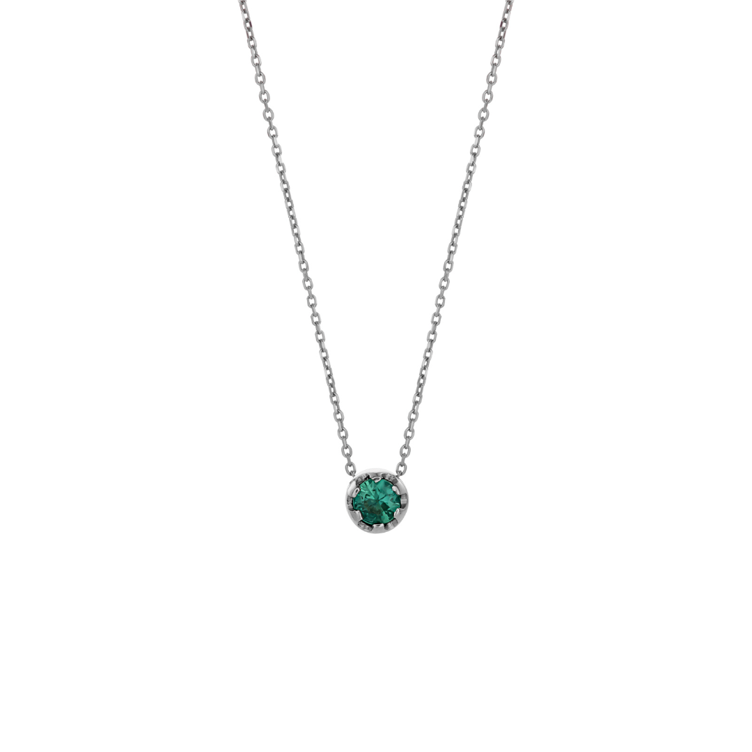 White gold pendant featuring a round emerald, suspended from a delicate gold chain. 