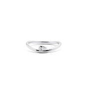 A 14k white gold ring featuring a pear-shaped diamond centered on the top, with a white background.
