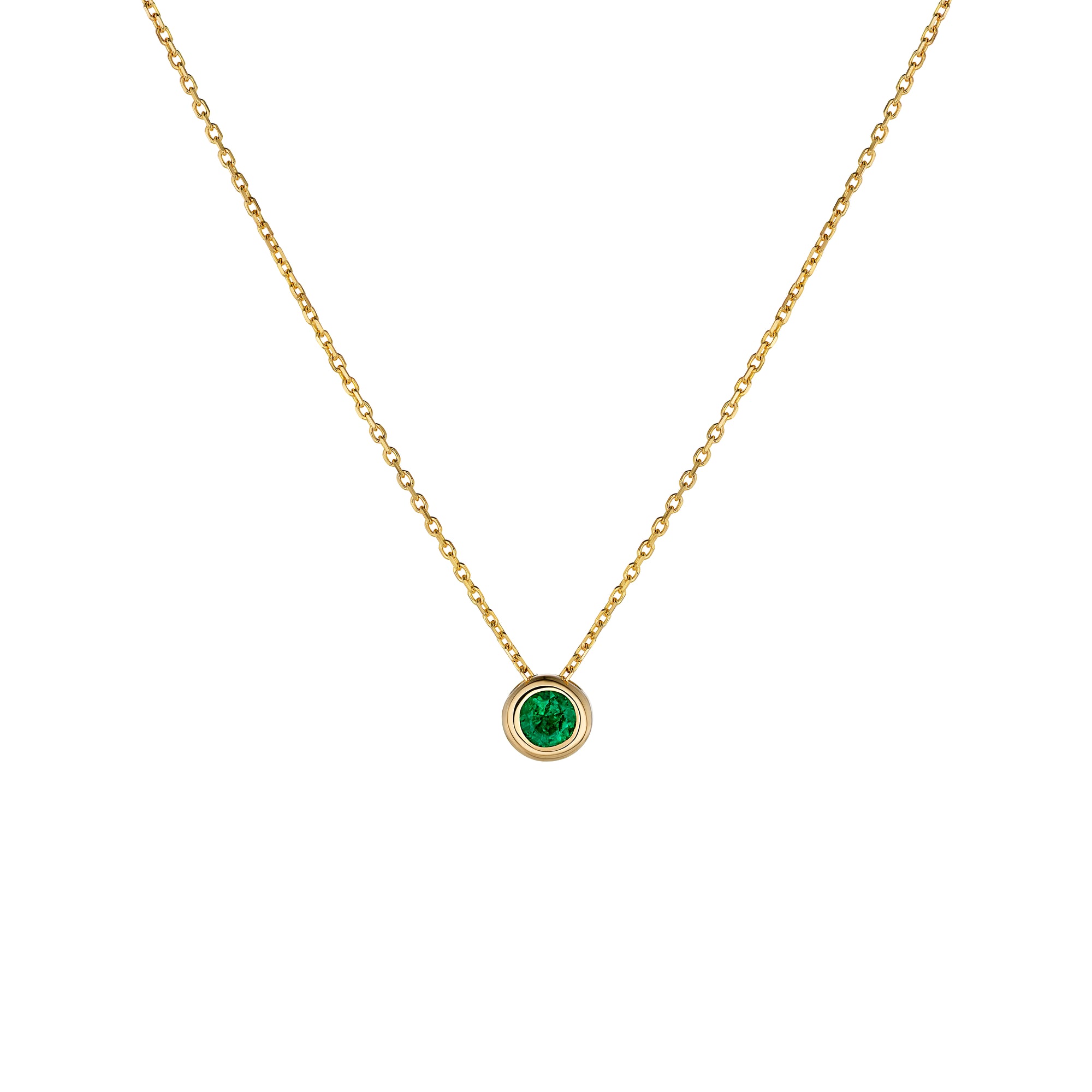 Yellow gold necklace with emerald pendant on a white background