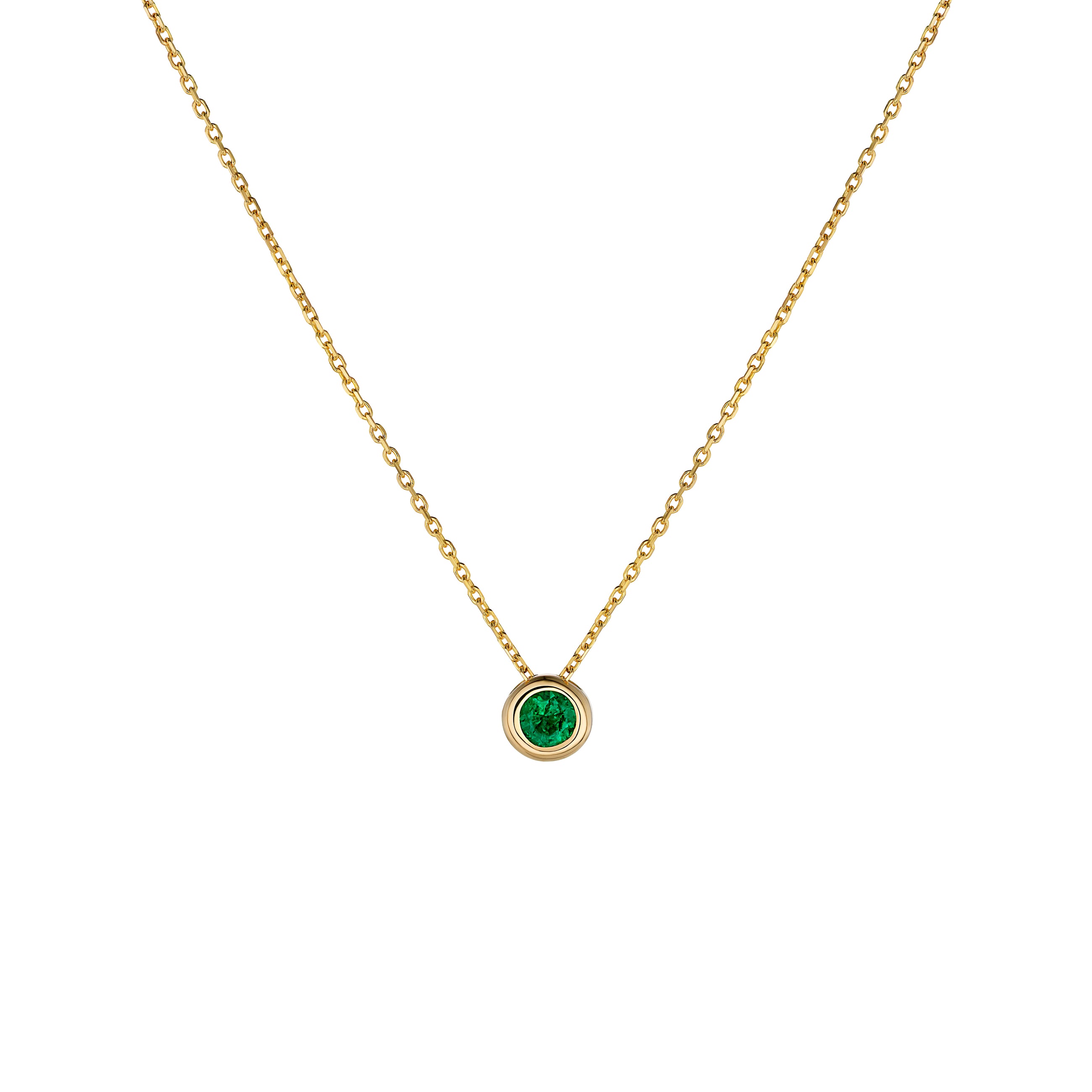 Yellow gold necklace with emerald pendant on a white background