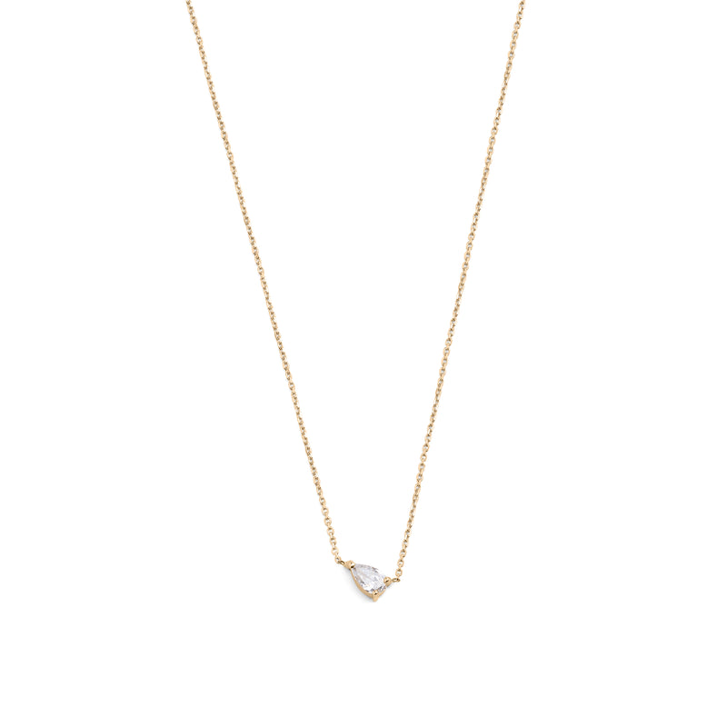 A 14k yellow gold necklace with a pear-shaped diamond centerpiece, on a white background.