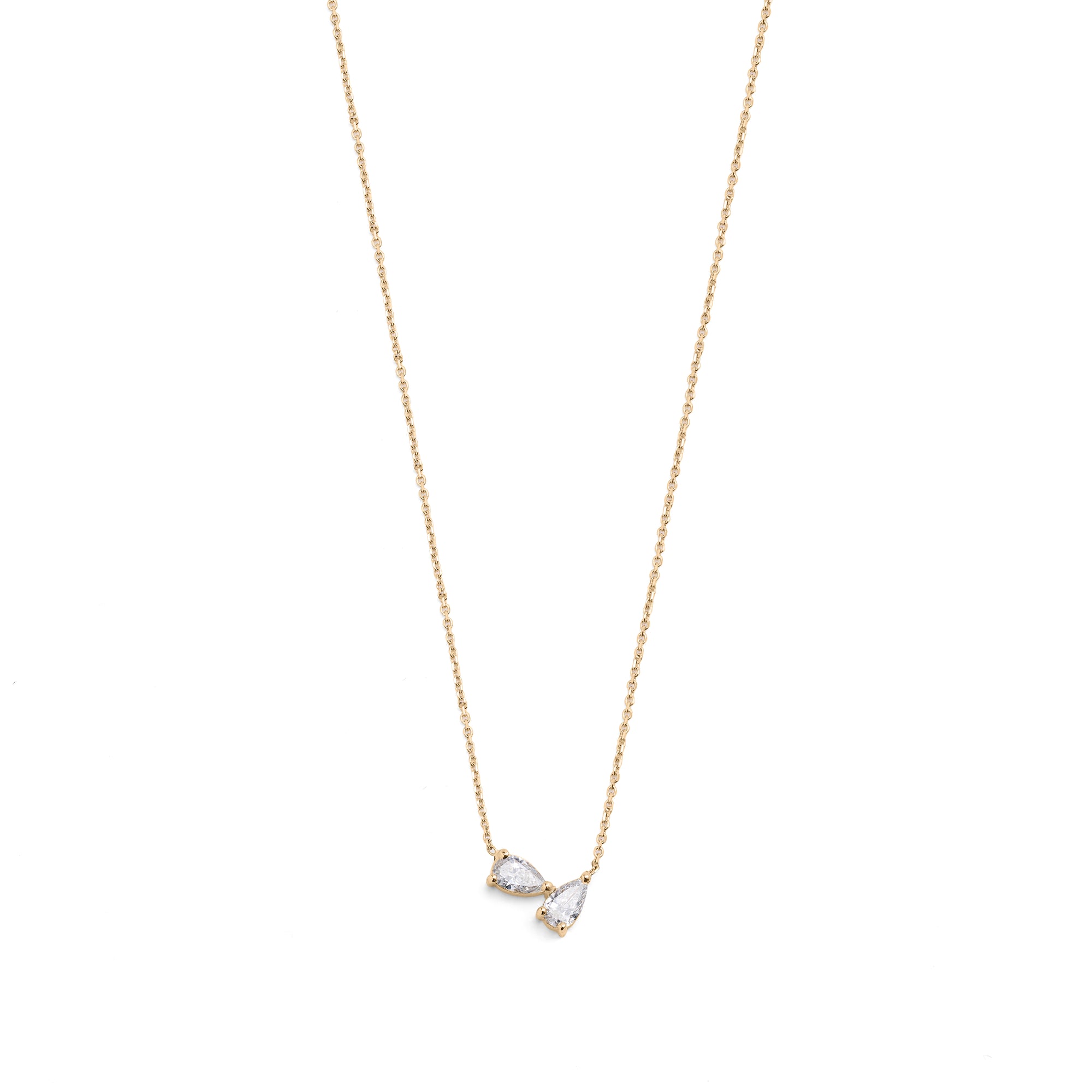 A 14k yellow gold necklace featuring two pear-shaped diamonds.