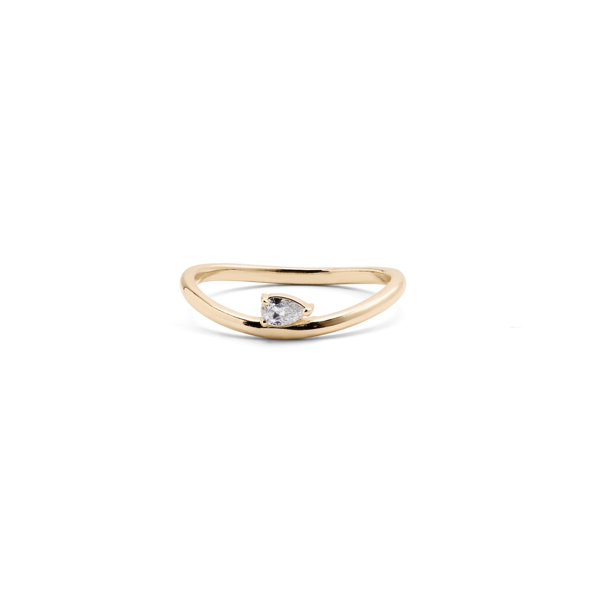 A 14k yellow gold ring with a pear-shaped diamond centerpiece.