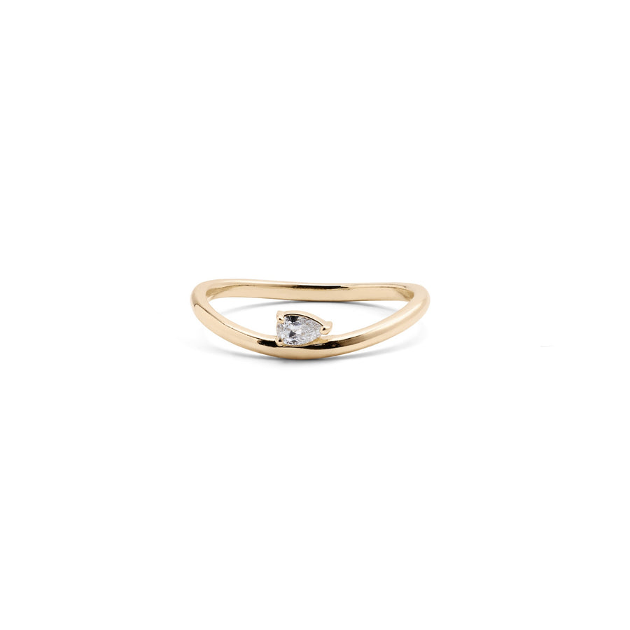 A 14k yellow gold ring with a pear-shaped diamond centerpiece.