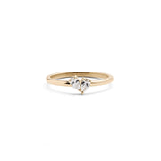 A 14k yellow gold ring with two pear-shaped diamonds set in the band.