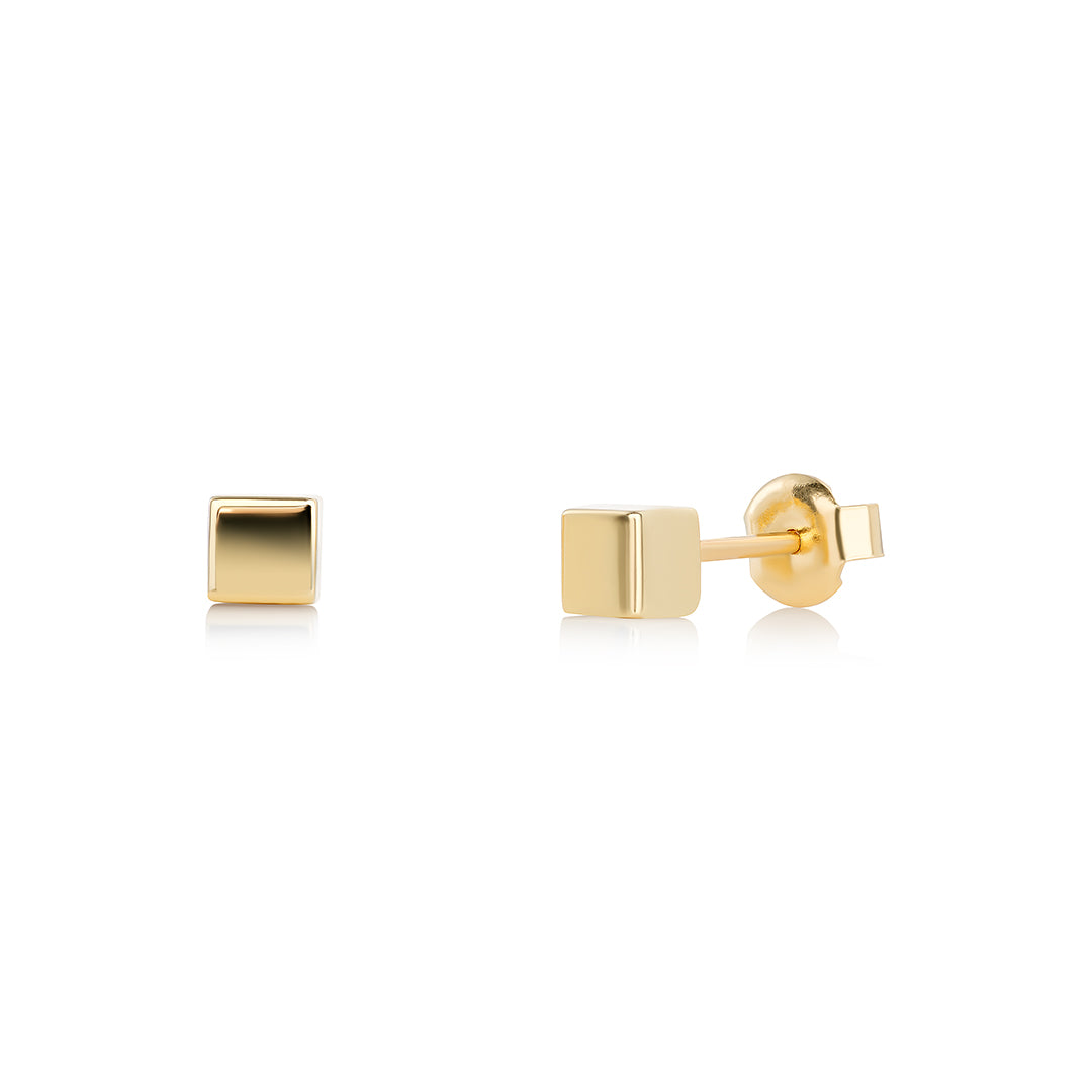 A pair of 14k yellow gold squared stud earrings.
