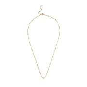 Gold necklace on a white background