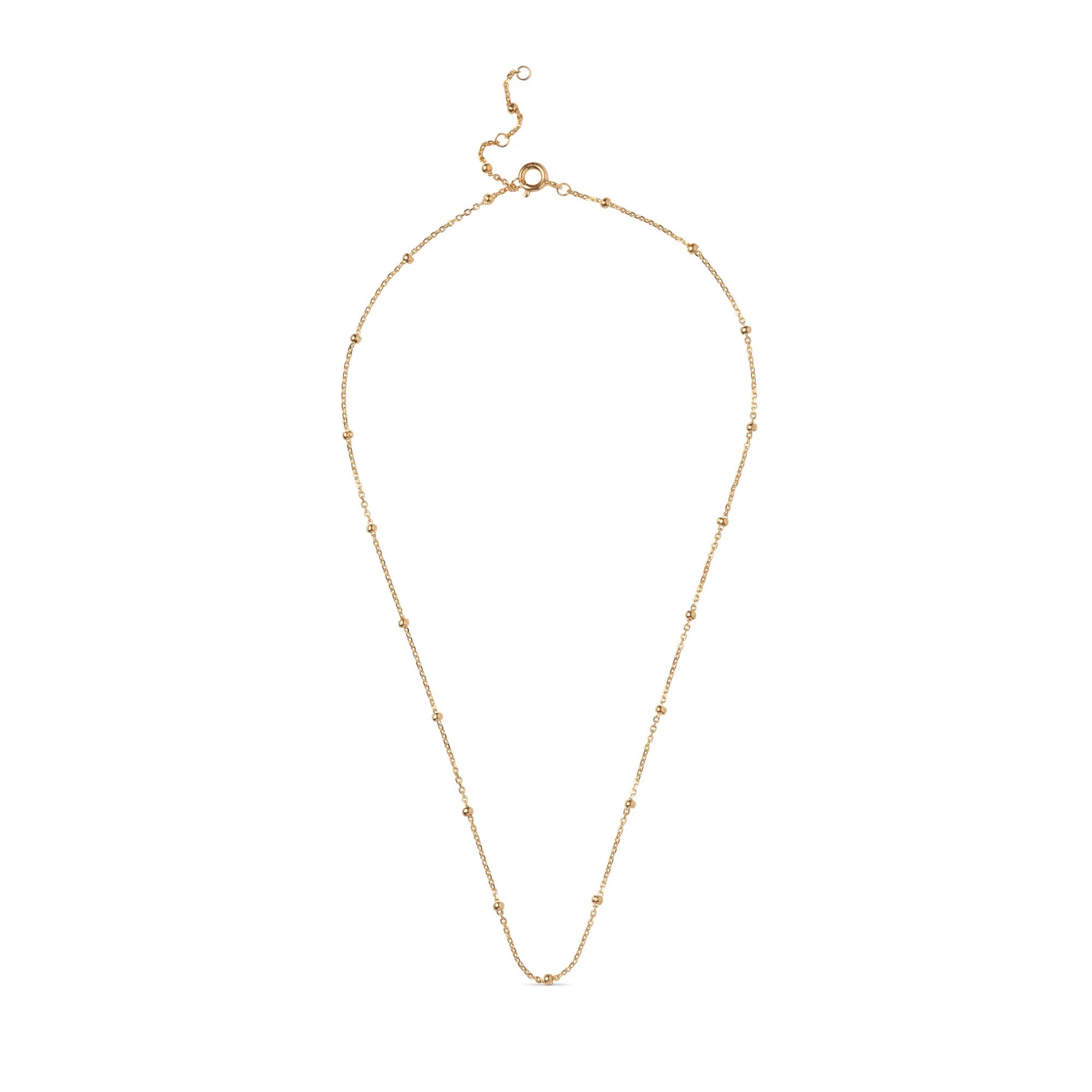 Gold necklace on a white background