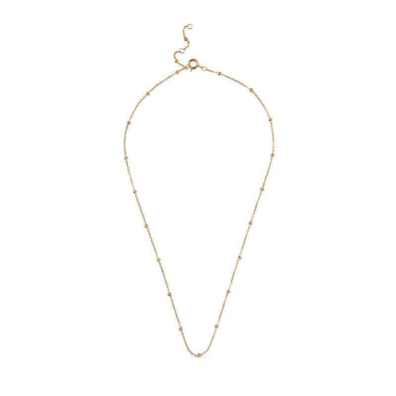 Gold necklace on a white background
