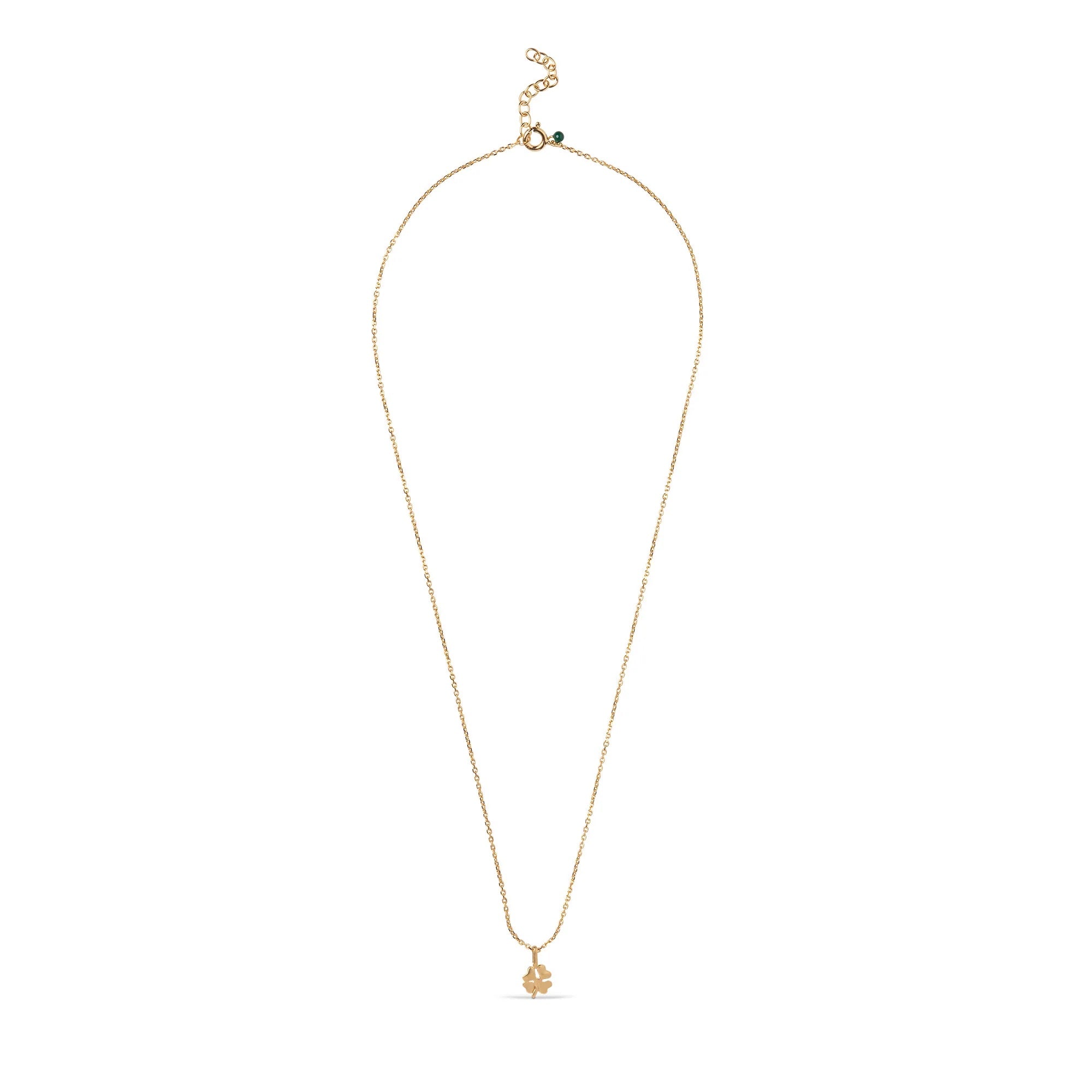 Gold necklace with a small pendant on a white background