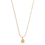 Gold necklace with a clover-shaped pendant on a white background