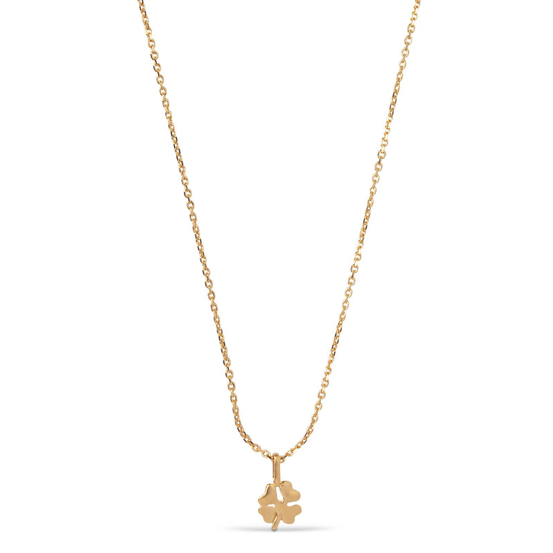 Gold necklace with a clover-shaped pendant on a white background