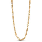 Gold chain necklace on a white background