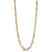 Gold chain necklace on a white background
