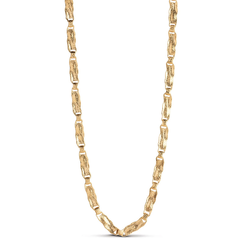 Gold chain necklace on a white background