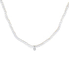Pearl necklace on a white background