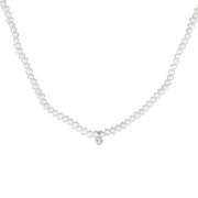 Pearl necklace on a white background