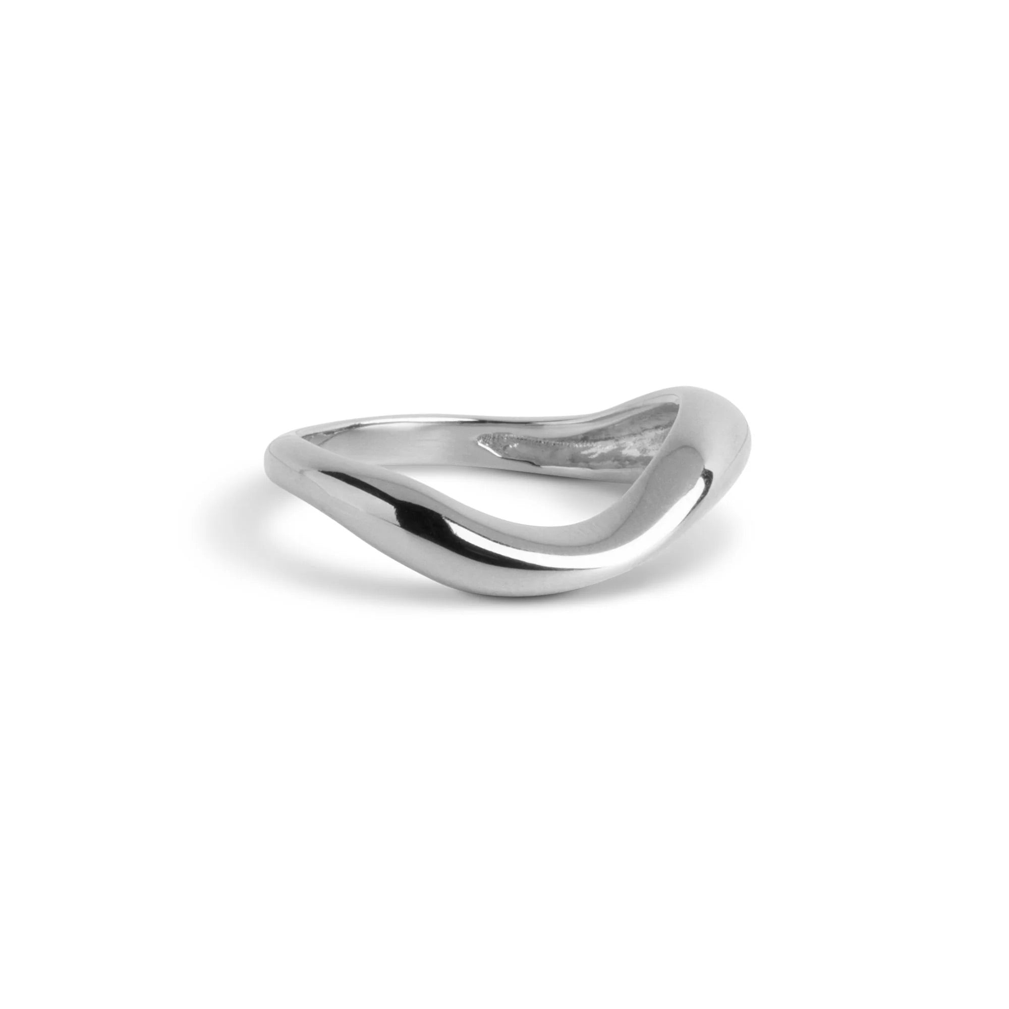 Silver ring with a wavy design on a white background