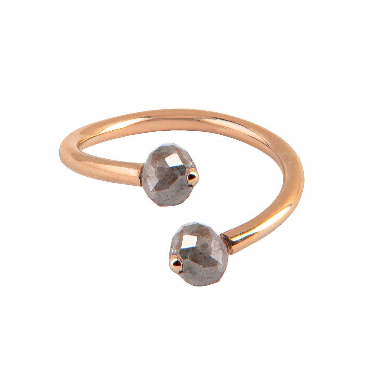 A gold open cuff ring featuring two faceted gray diamonds, photographed on a clean white background.