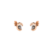 A pair of gold crescent-shaped stud earrings with round grey diamonds, shown on a plain white background.

