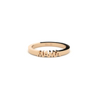 A rose gold ring with the word 'Mama' displayed against a white background.