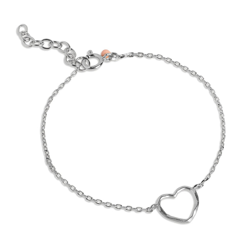 Silver bracelet with a heart-shaped pendant on a white background