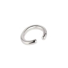 A polished silver-toned metal open-ended ring ear cuff, shown on a plain white background.