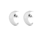 A pair of glossy white crescent-shaped hoop earrings with silver post backs, shown against a solid white background.