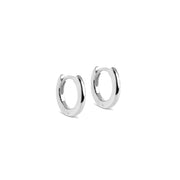 Pair of silver hoop earrings on a white background