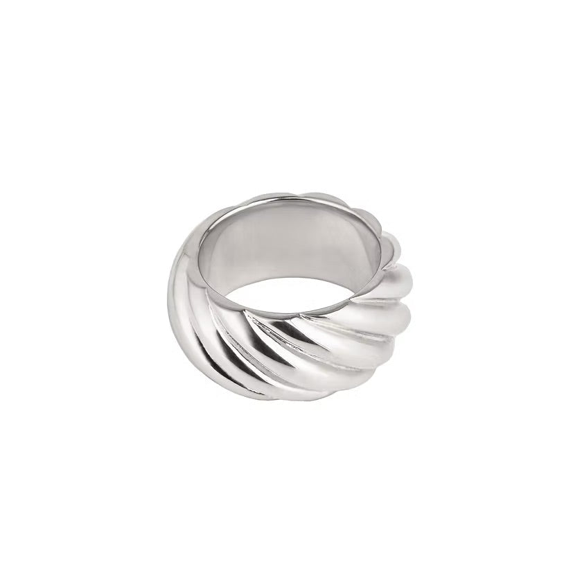 A silver twisted ring with a textured spiral design, shown on a solid white background.