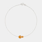Silver bracelet with two asymmetrical Baltic ambers by Adele Notes.