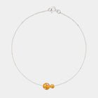Silver bracelet with two asymmetrical Baltic ambers by Adele Notes.