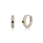 Pair of hoop earrings with blue sapphires on a white background