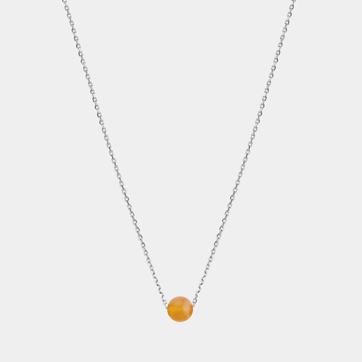 Silver necklace with Baltic amber pendant by Adele Notes.
