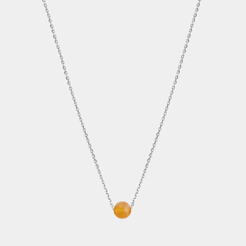 Silver necklace with Baltic amber pendant by Adele Notes.