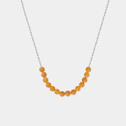 Necklace with Baltic amber beads on a white background