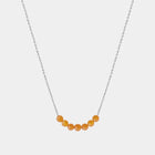 Necklace with Baltic amber beads on a white background