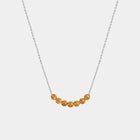 Necklace with Baltic amber beads on a white background