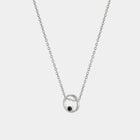 Silver necklace with a black zirconium pendant on a white background
