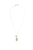 Infinity-shaped pendant featuring baroque shaped freshwater pearl. 