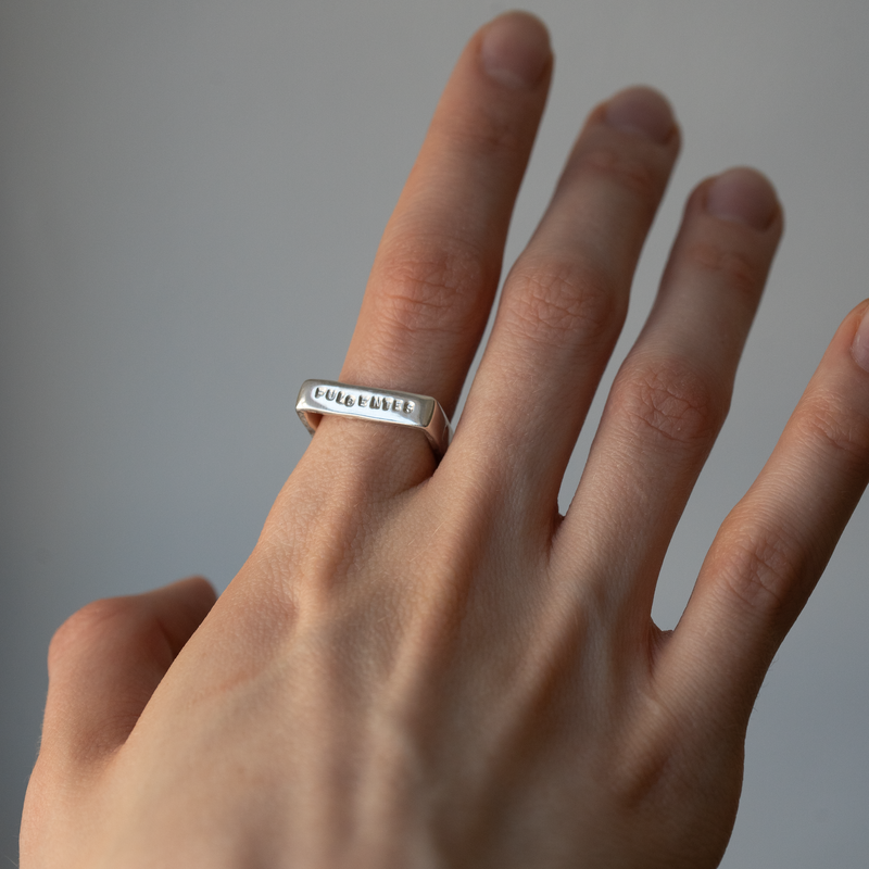 Silver ring with inscription in Latin