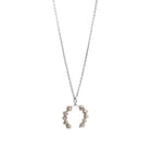 White gold necklace with a faceted grey diamonds pendant on a white background.